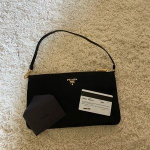 New Prada pouch bag! 100% authentic .